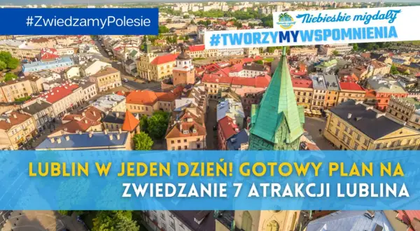 Widok z lotu ptaka na Lublin z kolorowymi kamienicami i zieloną wieżą kościelną.